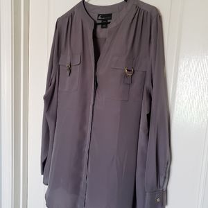 Grey blouse with gold metal accents